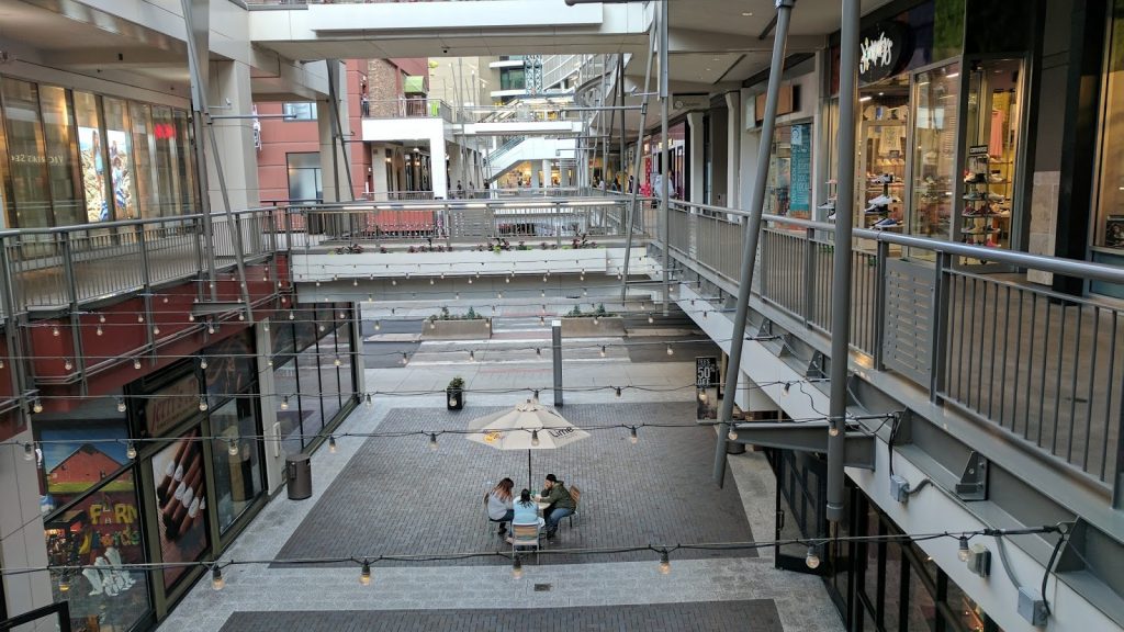 Interior of a semi-indoor building on the pedestrian mall in downtown Denver.